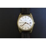 A VINTAGE OMEGA GENEVE DATE WRIST WATCH, on replacement leather strap and presentation engraving