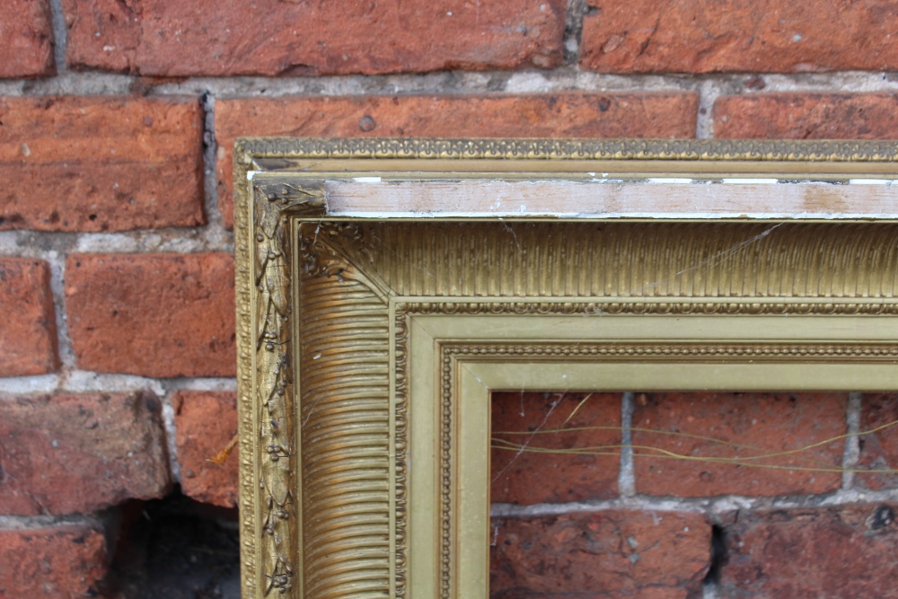 A 19TH CENTURY GILT REEDED PICTURE FRAME, plain slip. W 12 cm, rebate 68 x 52 cm A/F - Image 4 of 6