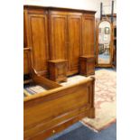 A BRIGITTE FORESTIER CHERRYWOOD LARGE BREAKFRONT WARDROBE, H 209 cm, W 268 cm, together with a