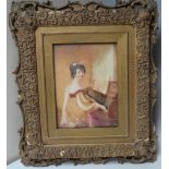 (XIX). Study on ivory of a young woman playing a piano, unsigned, framed and glazed, 17 x 12.5 cm