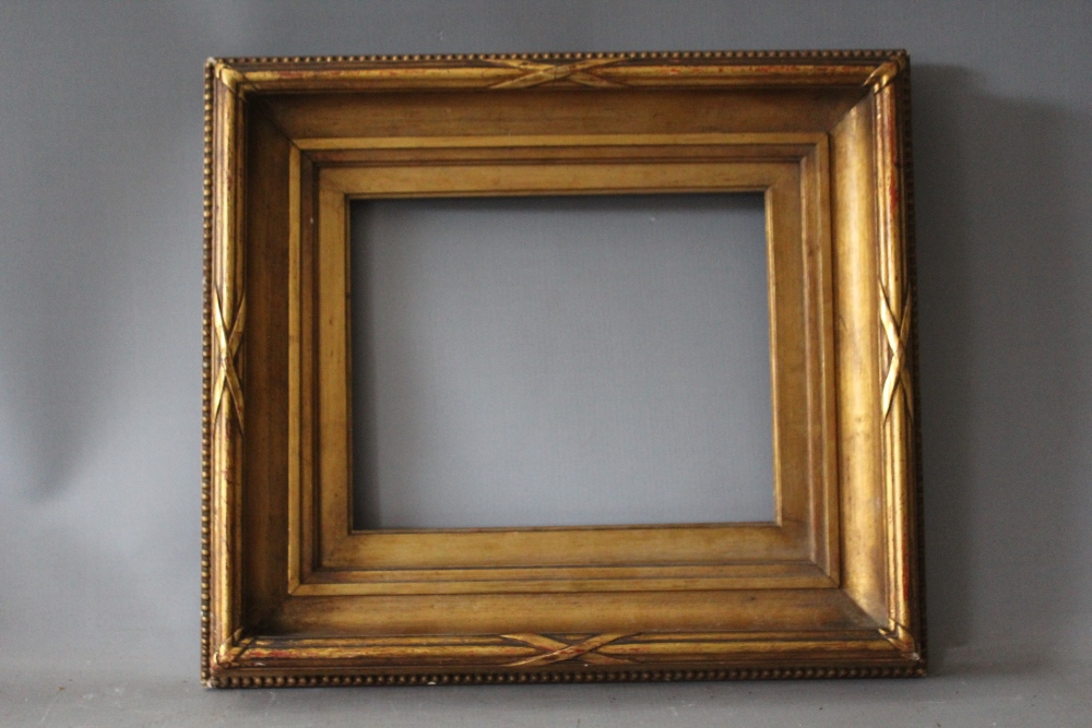 A 19TH CENTURY GOLD FRAME WITH GOLD SLIP, frame W 6.5 cm, slip rebate 21 x 26 cm, frame rebate 25