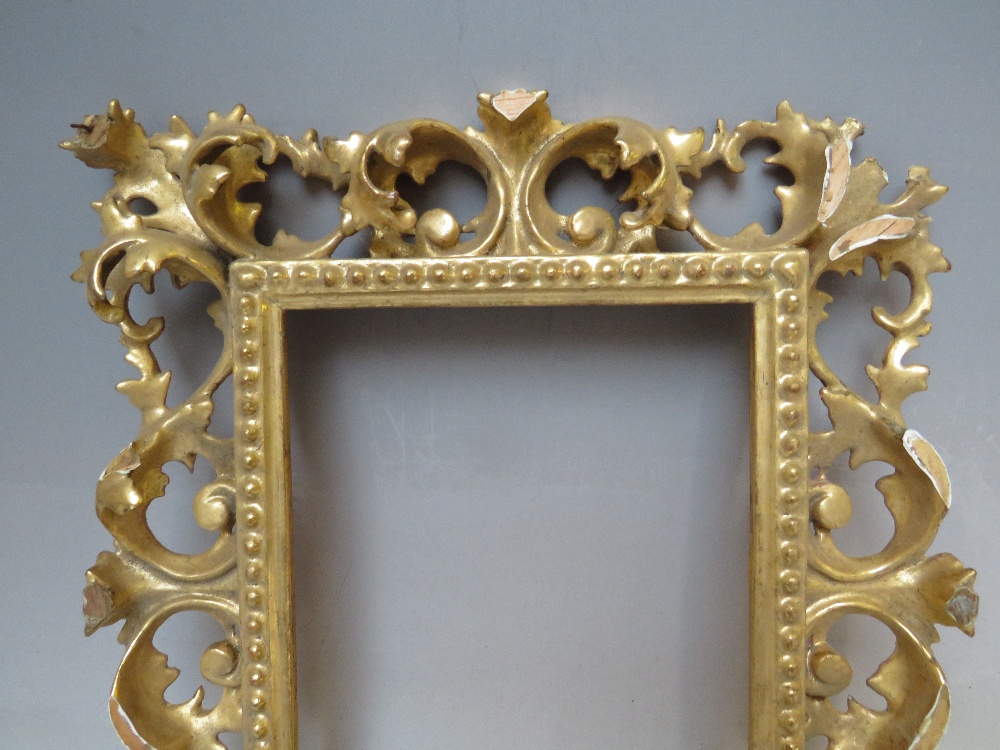 A 19TH CENTURY CARVED WOODEN GILT FLORENTINE FRAME FOR RESTORATION, rebate 19 x 15 cm - Image 2 of 4