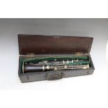 AN ANTIQUE CASED MULTI SECTION CLARINET, case W 38 cm