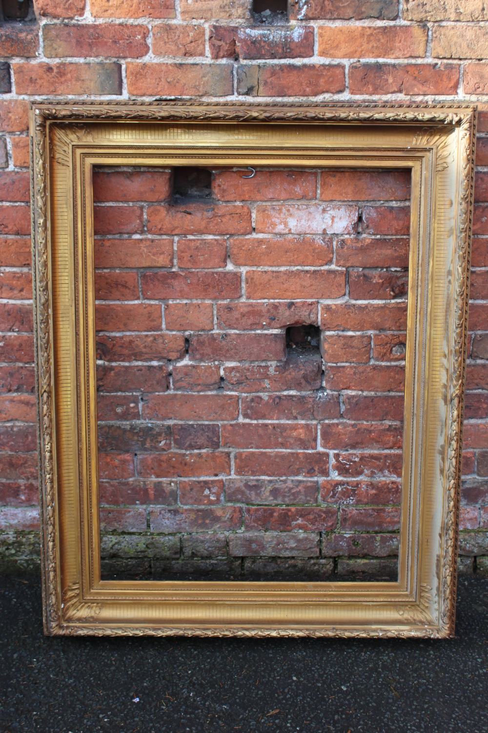 A 19TH CENTURY GILT PICTURE FRAME, plain slip, with reeded detail to the frame, frame W 14 cm,