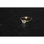 AN 18CT BRILLIANT CUT DIAMOND SOLITAIRE RING, of an estimated quarter carat, approx weight 1.9g,