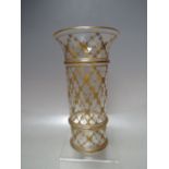 AN EARLY 20TH CENTURY CLEAR AND GILT GLASS VASE, of cylindrical form with flared rim, H 20.5 cm