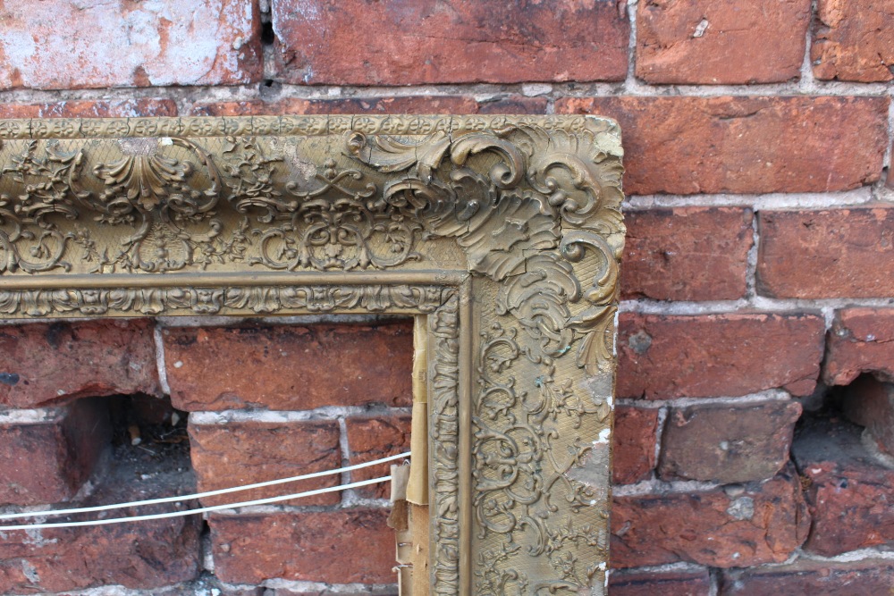 A 19TH CENTURY GILT PICTURE FRAME, with foliate moulding throughout, W 12.5 cm, rebate 68 x 81 cm