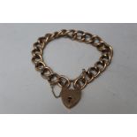 A HALLMARKED 9CT GOLD BRACELET, individually hallmarked to each link, the heart shaped clasp