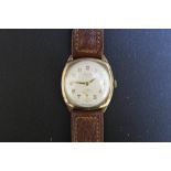 A VINTAGE HALLMARKED 9 CARAT GOLD AVIA WRIST WATCH, on leather strap, Dia 3.25 cm