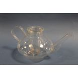 A JENAER GLASS TEAPOT AND COVER WITH ORIGINAL INFUSER, by Schorr & Genossen, Mainz, designed by