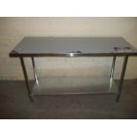 A STAINLESS STEEL KITCHEN PREP TABLE