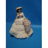 A COALPORT FIGURINE 'LILAC'