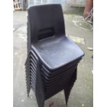 TWELVE STACKING MOULDED CHAIRS