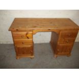 A SOLID PINE DRESSING TABLE / DESK
