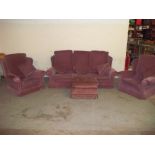 A THREE PIECE QUEEN ANNE WING BACKED SUITE COMPRISING THREE SEATER SOFA AND TWO CHAIRS, SPRUNG EDGE