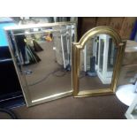 TWO FRAMED MIRRORS THE LARGEST 88 CM BY 62 CM