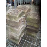 A QUANTITY OF ANTIQUE CONCRETE WALL CAPPING STONES