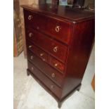 A STAG MINSTREL SEVEN DRAWER CHEST OF DRAWERS