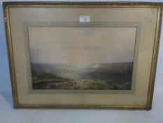 A FRAMED AND GLAZED WATERCOLOUR OF LANDSCAPE SCENE SIGNED TO THE LOWER RIGHT
