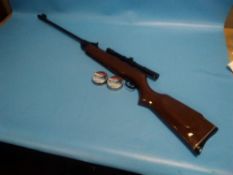 22 CALIBER AIR RIFLE WITH TELESCOPIC SIGHTS, BAG AND 2 TINS OF PELLETS