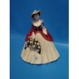 A COALPORT FIGURINE 'HOLLY BRIGHT'