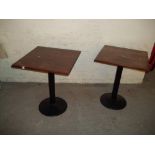 TWO STEEL BASED SINGLE PEDESTAL CAFE TABLES