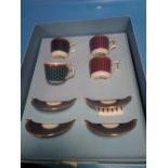 A WEDGWOOD BYZANCE BOXED CUPS AND SAUCERS SET