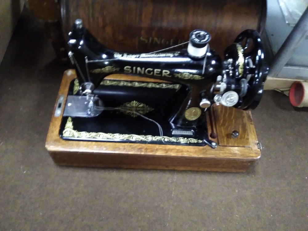 A SINGER SEWING MACHINE