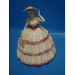 A COALPORT FIGURINE 'CARNATION'