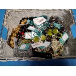 A TUB OF ASSORTED COSTUME JEWELLERY