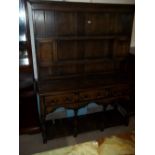 AN ANTIQUE OAK DRESSER IN THE STYLE OF TITCHMARSH & GOODWIN¦++slightly wormed¦