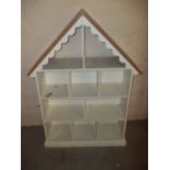 A CHILDREN'S HOUSE STYLE BOOKCASE