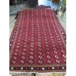 A LARGE PERSIAN WOOLLEN RUG 309 200 CM