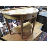 A MODERN HONEY PINE HALF MOON HALL TABLE WITH SMALL DRAWER W-89 CM
