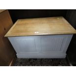 A MODERN OAK AND PAINTED SMALL LINENFOLD BLANKET BOX W-81 CM