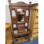 AN EDWARDIAN MAHOGANY ART NOUVEAU STYLE HALLSTAND