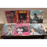 A COLLECTION OF SEVEN ELVIS PRESLEY RECORDS