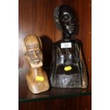 A CARVED WOODEN AFRICAN/ TRIBAL STYLE FIGURE, TOGETHER WITH A STONE HEAD CARVING (2)