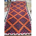 AN AFGHAN WOOLLEN RUG 291 X 142 CM