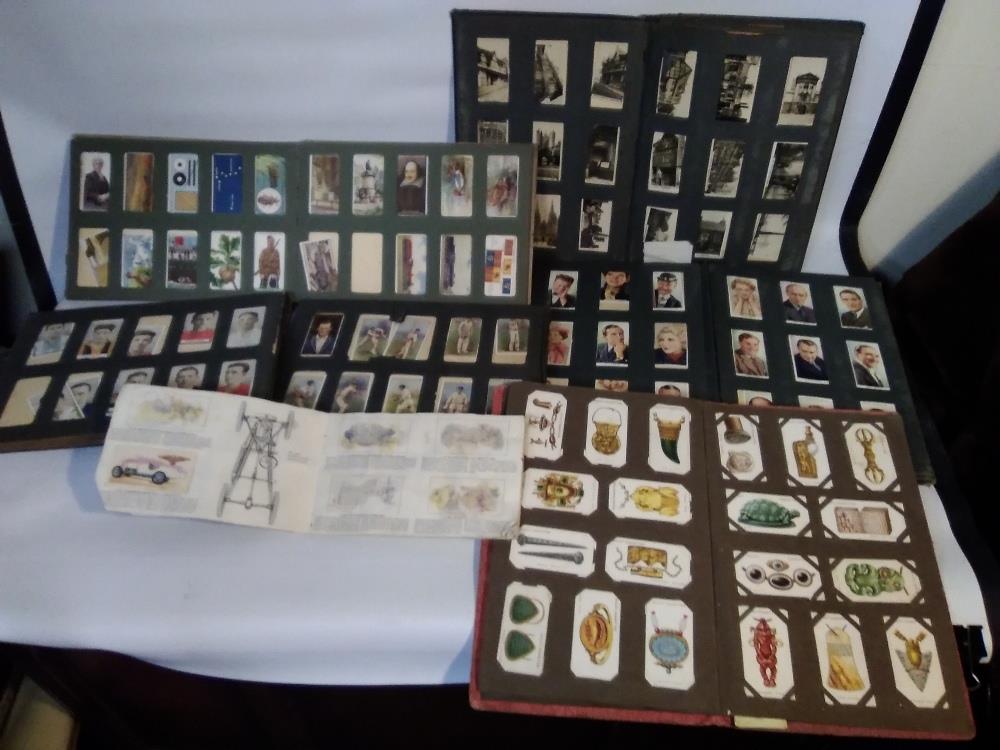 TWO BOXES OF CIGARETTE CARDS, MAINLY IN ALBUMS, to include a small quantity of silks