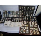 TWO BOXES OF CIGARETTE CARDS, MAINLY IN ALBUMS, to include a small quantity of silks