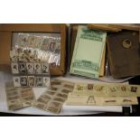 A LARGE QUANTITY OF CIGARETTE CARDS LOOSE AND IN ALBUMS, to include areoplanes, garden flowers,