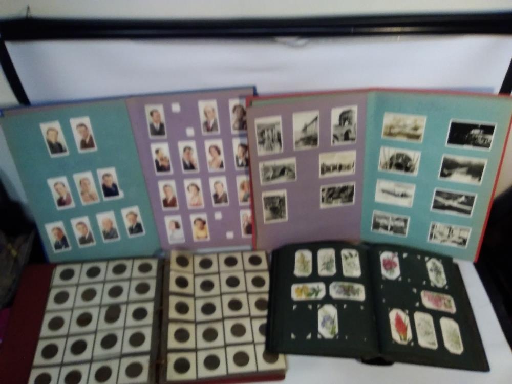 A QUANTITY OF ALBUMS OF CIGARETTE CARDS, to include Wild Flowers, Fresh Water Fish, Natural Flags,