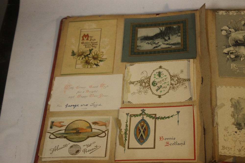 AN EDWARDIAN SCRAP BOOK CONTAINING A COLLECTION OF GREETINGS CARDS, to include various dated - Image 2 of 10
