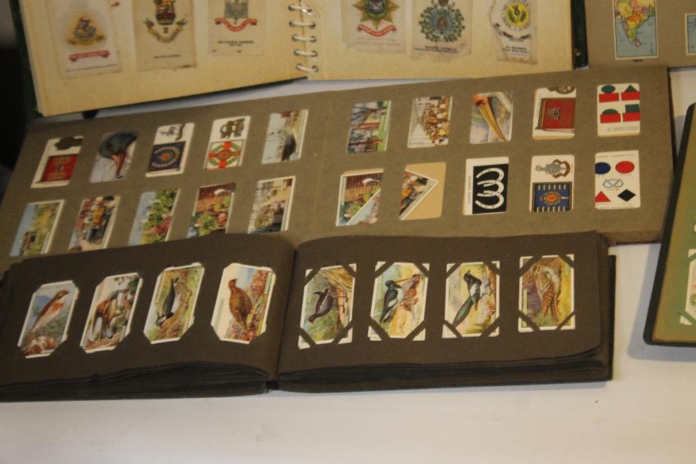 A COLLECTION OF CIGARETTE CARDS IN VARIOUS ALBUMS, to include a small quantity of silks of British - Image 6 of 6