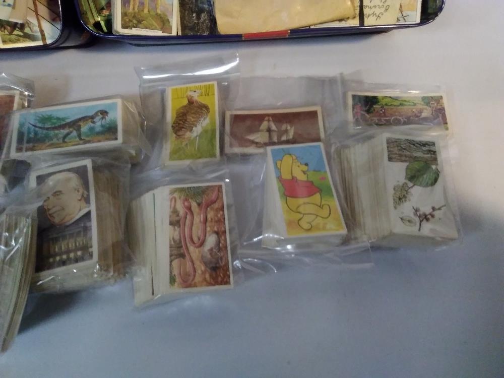 THREE TINS OF ASSORTED TEA AND CIGARETTE CARDS, LOOSE AND IN SLOTS - Image 3 of 5