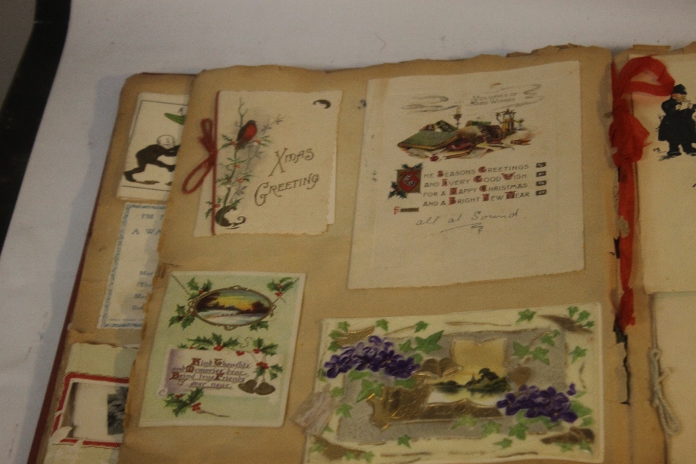 AN EDWARDIAN SCRAP BOOK CONTAINING A COLLECTION OF GREETINGS CARDS, to include various dated - Image 4 of 10