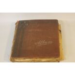 AN EDWARDIAN SCRAP BOOK CONTAINING A COLLECTION OF GREETINGS CARDS, to include various dated