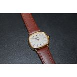 A LADIES TISSOT AUTOMATIC WRIST WATCH ON LEATHER STRAP