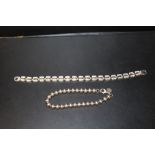 TWO SILVER BRACELETS - 21.1G